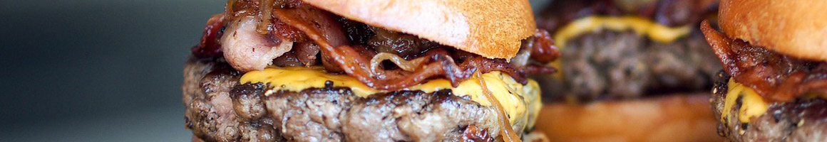 Eating Burger Fast Food at Frugals restaurant in Kalispell, MT.